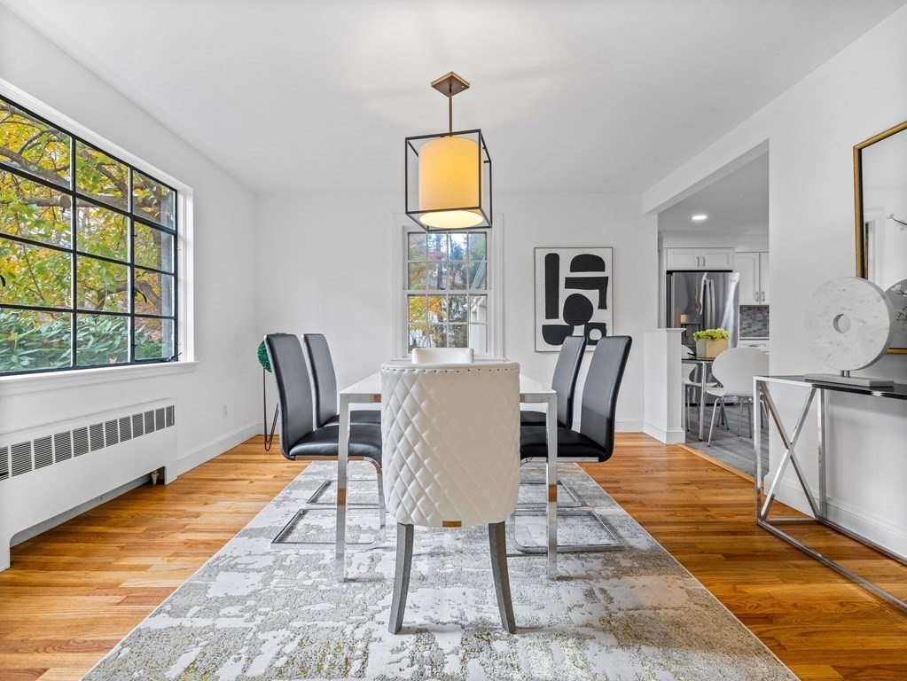31 Bay State Road Wellesley, MA 02481 - Photo 5 of 24 a view of a dining room with furniture and a window