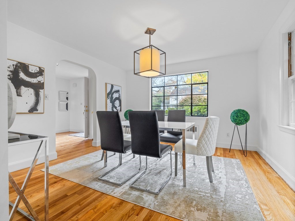 31 Bay State Road Wellesley, MA 02481 - Photo 6 of 24 a view of a dining room with furniture window and wooden floor