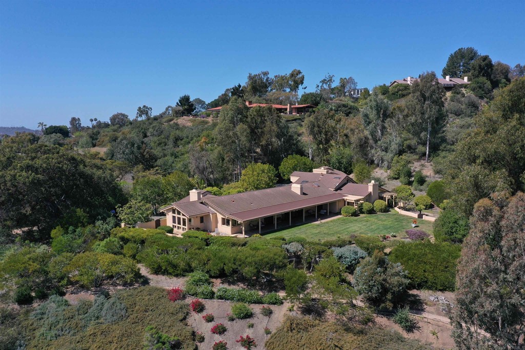 16854 Los Morros Rancho Santa Fe, CA 92067 - Photo 1 of 40 an aerial view of a house with a garden