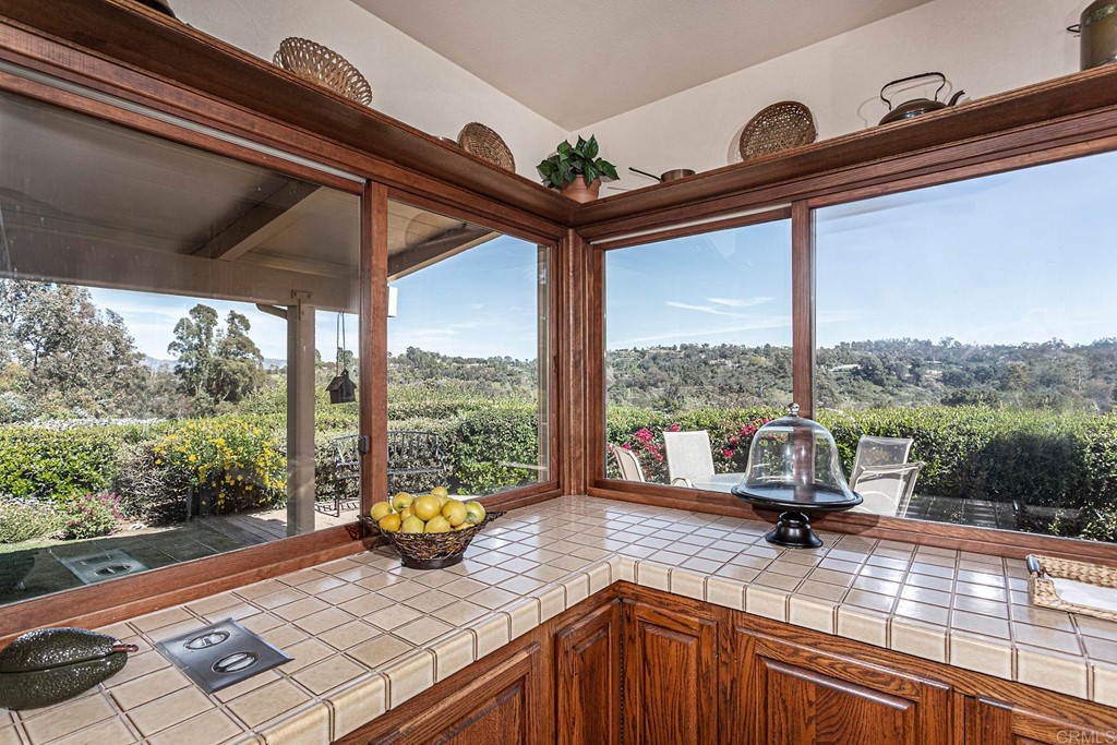 16854 Los Morros Rancho Santa Fe, CA 92067 - Photo 12 of 40 a view of a two chair in the balcony