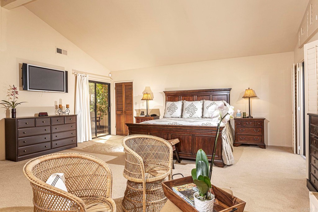 16854 Los Morros Rancho Santa Fe, CA 92067 - Photo 16 of 40 a living room with furniture and a flat screen tv