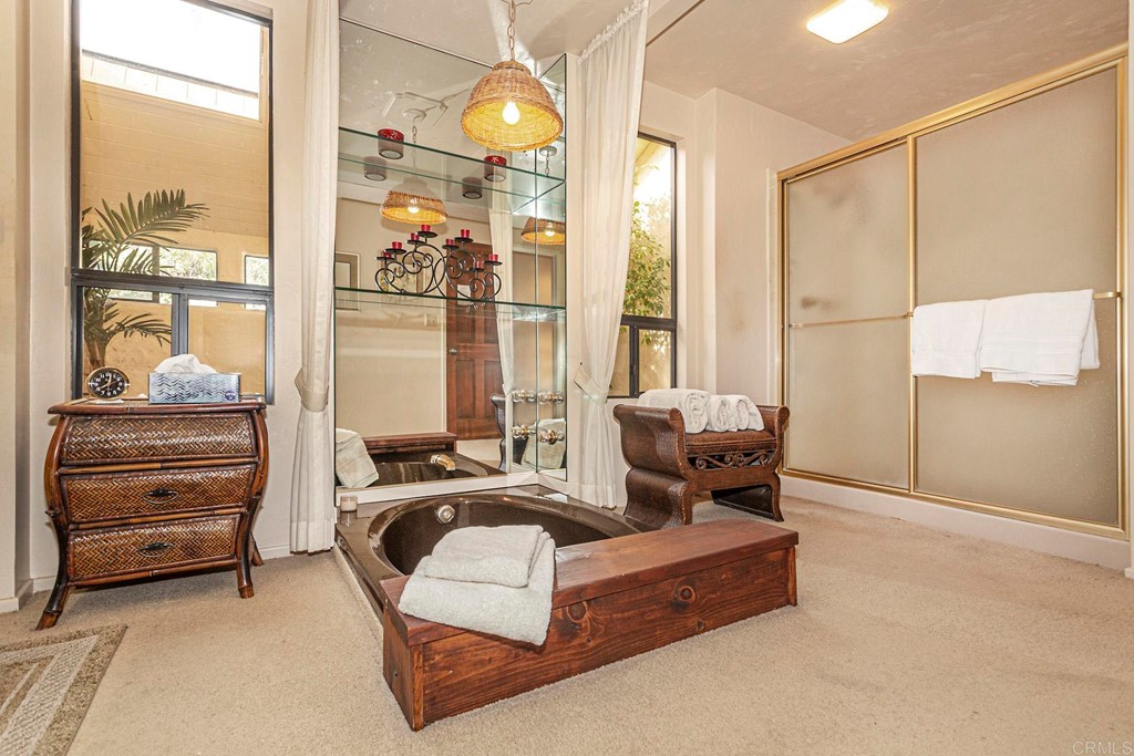 16854 Los Morros Rancho Santa Fe, CA 92067 - Photo 18 of 40 a living room with furniture and a large window