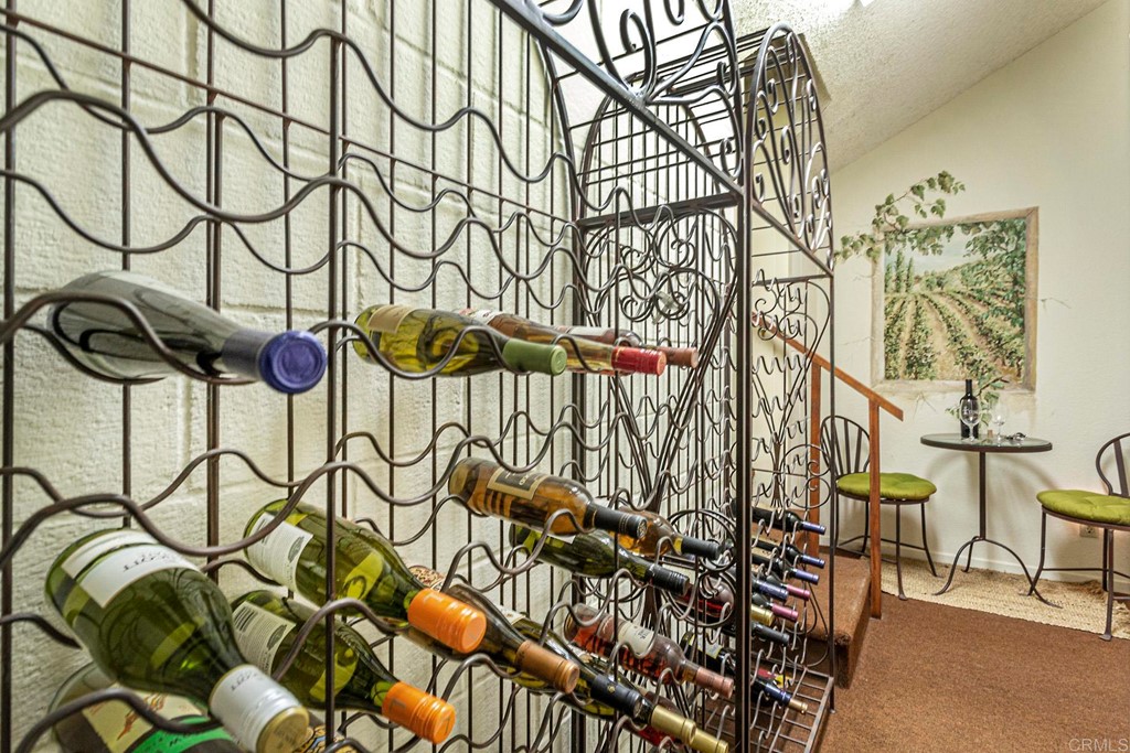 16854 Los Morros Rancho Santa Fe, CA 92067 - Photo 28 of 40 a picture of a bench in front of a building