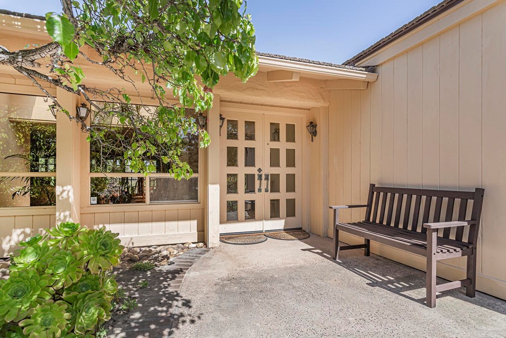 16854 Los Morros Rancho Santa Fe, CA 92067 - Photo 5 of 40 a view of a bench in the back yard