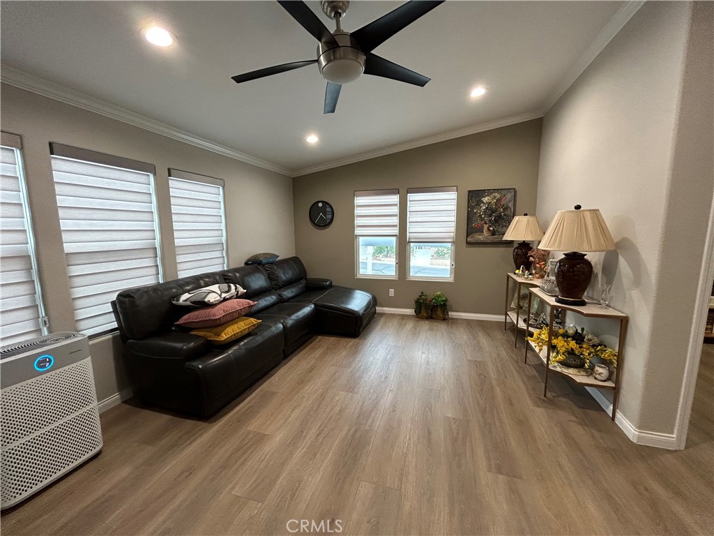 17 Gomes Way Brea, CA 92821 - Photo 12 of 47 a living room with furniture and a wooden floor