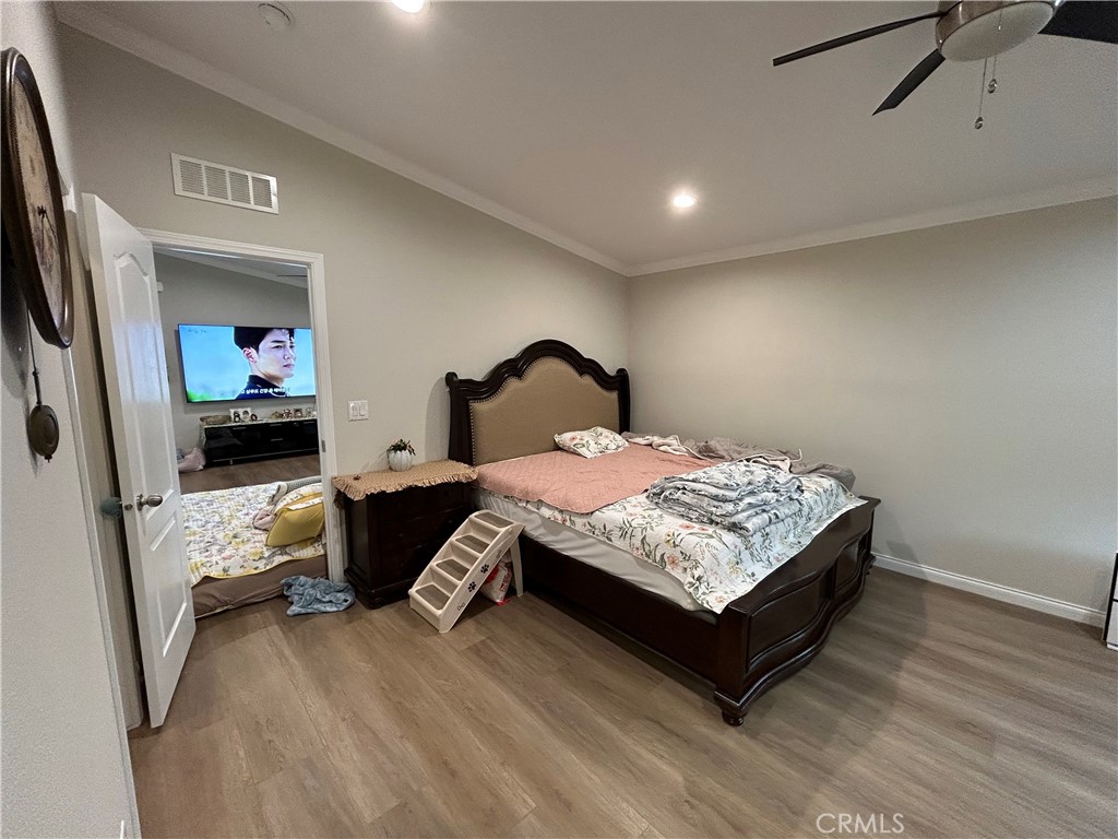 17 Gomes Way Brea, CA 92821 - Photo 16 of 47 a bedroom with a bed lamp and a dresser