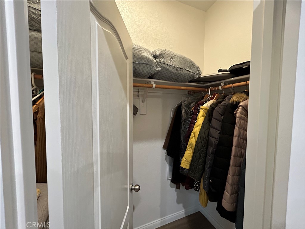 17 Gomes Way Brea, CA 92821 - Photo 17 of 47 a view of walk in closet with clothes and shoes