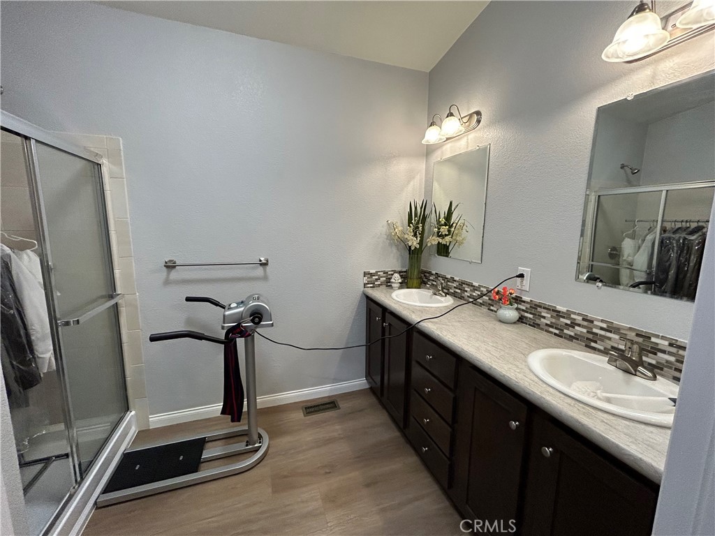 17 Gomes Way Brea, CA 92821 - Photo 18 of 47 a bathroom with a sink double vanity and a mirror