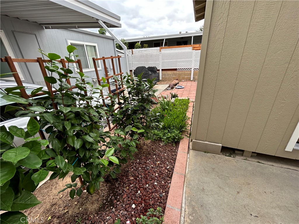 17 Gomes Way Brea, CA 92821 - Photo 29 of 47 a view of a house with a flower garden