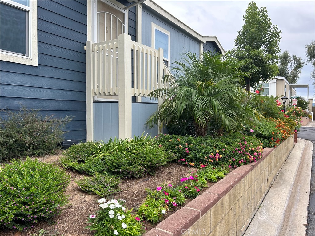 17 Gomes Way Brea, CA 92821 - Photo 41 of 47 a view of a house with a lot of flower garden