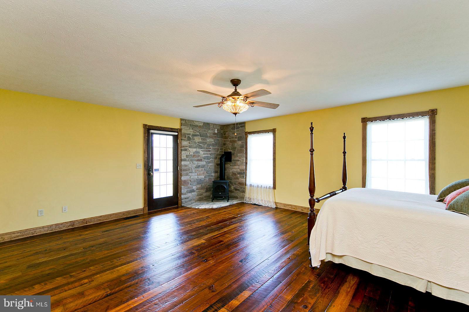 426 White Hall Road Winchester, VA 22603 - Photo 23 of 76 Master Bedroom with gas stove