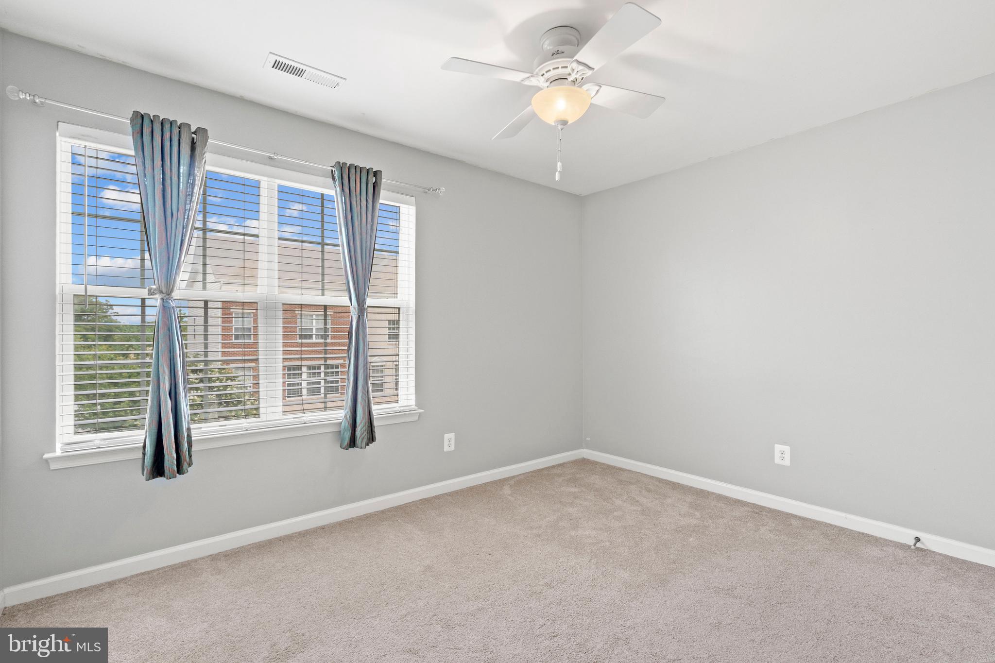 22667 Flowing Spring Square Brambleton, VA 20148 - Photo 18 of 39 an empty room with windows