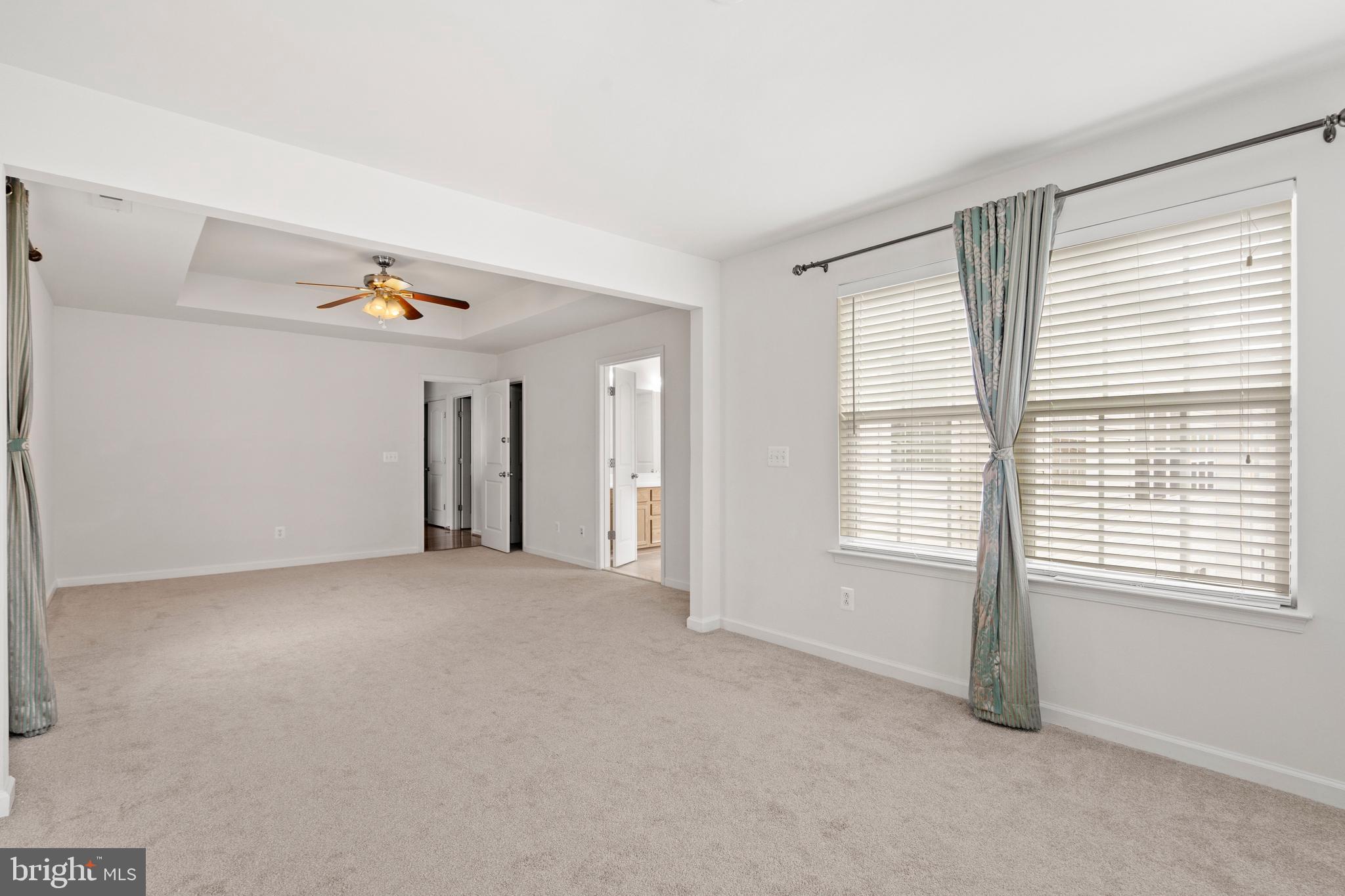 22667 Flowing Spring Square Brambleton, VA 20148 - Photo 25 of 39 a view of empty room with window
