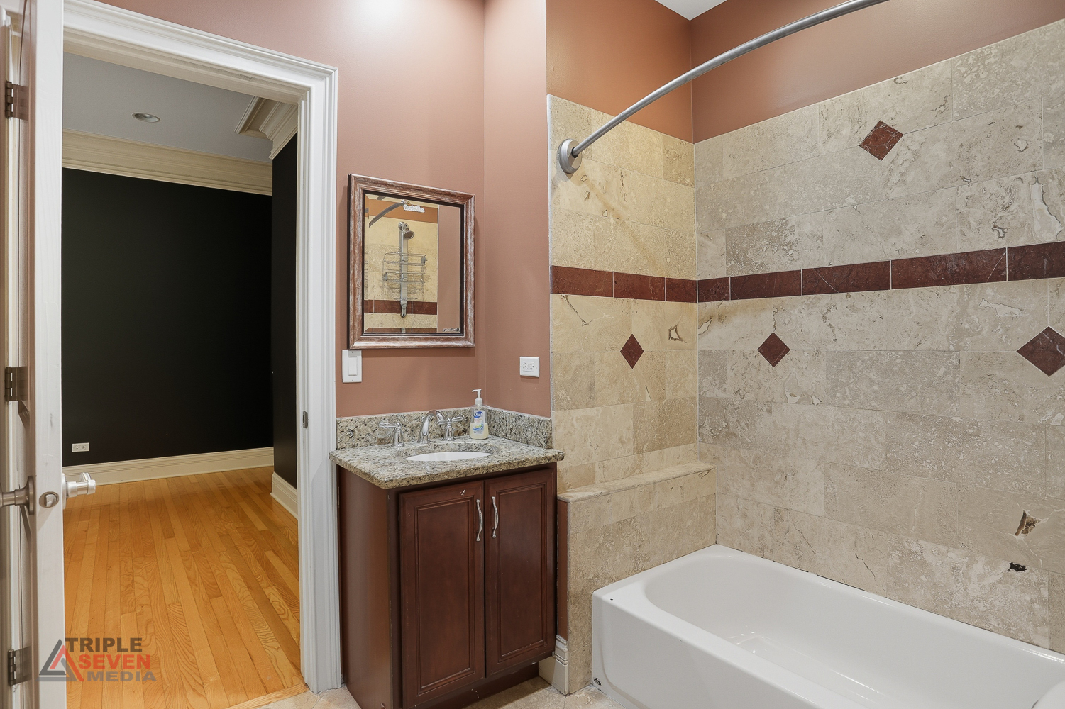 5039 South Michigan Avenue, Unit 1S Chicago, IL 60615 - Photo 16 of 25 a bathroom with a granite countertop sink toilet and shower
