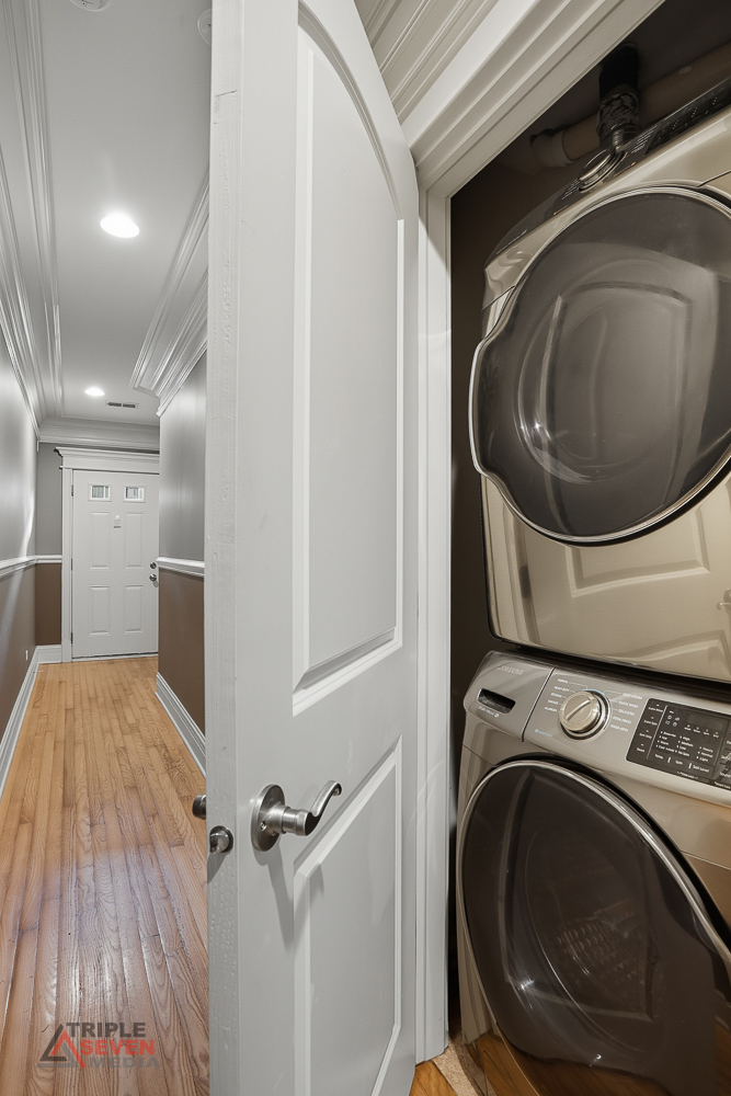 5039 South Michigan Avenue, Unit 1S Chicago, IL 60615 - Photo 22 of 25 a utility room with dryer and washer