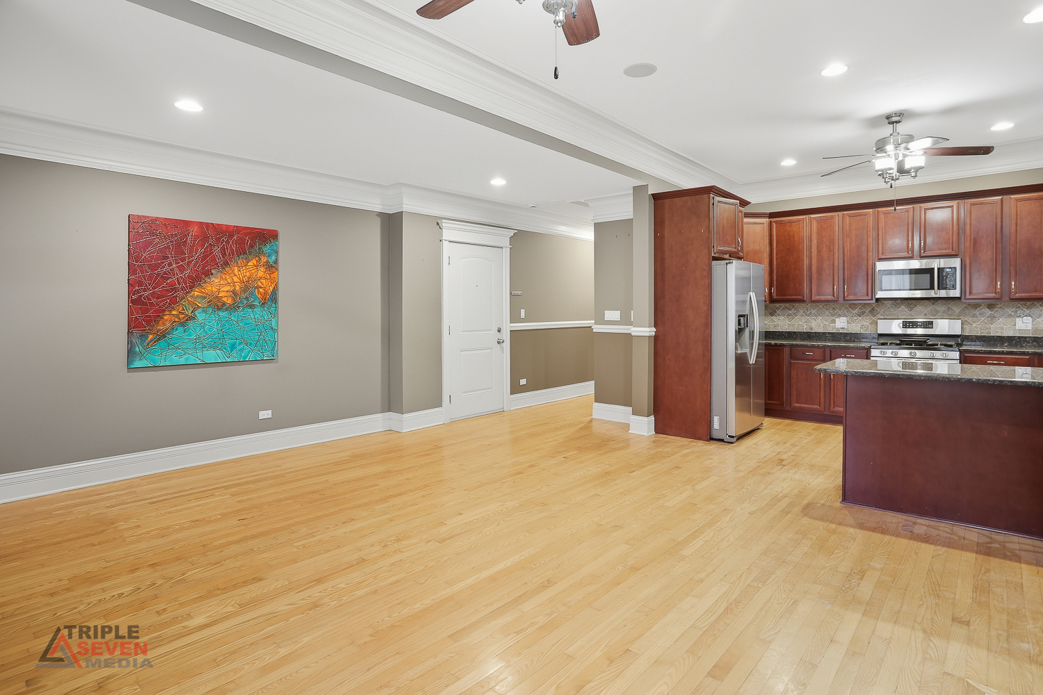 5039 South Michigan Avenue, Unit 1S Chicago, IL 60615 - Photo 5 of 25 a view of kitchen with stainless steel appliances kitchen island microwave and stove