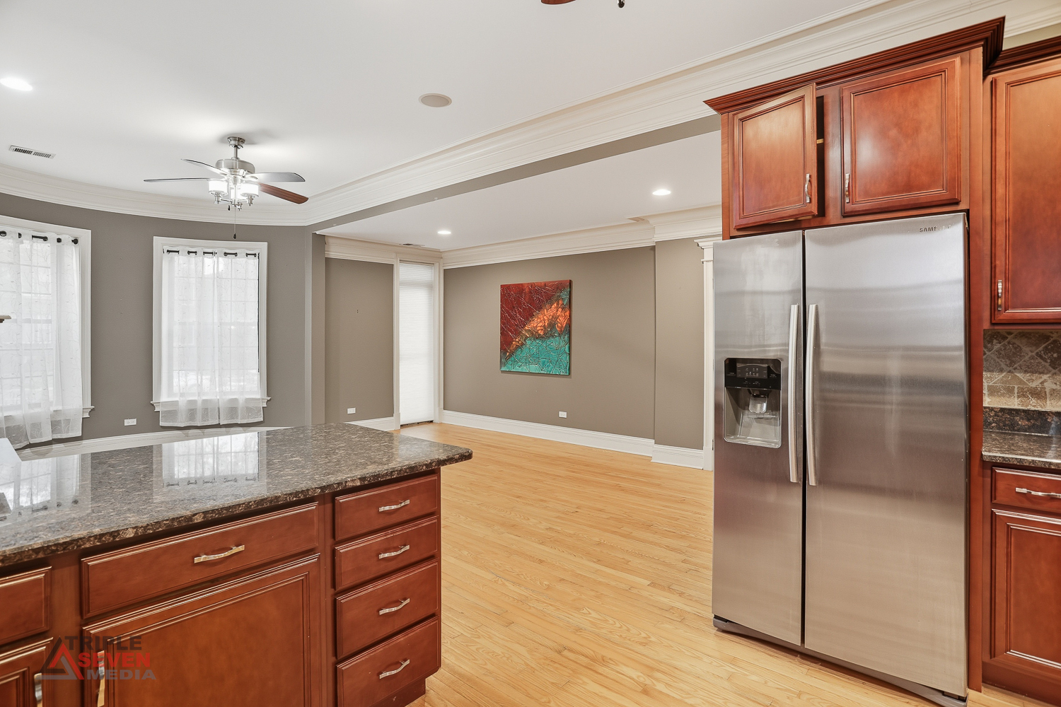 5039 South Michigan Avenue, Unit 1S Chicago, IL 60615 - Photo 7 of 25 a kitchen with granite countertop a refrigerator and a sink