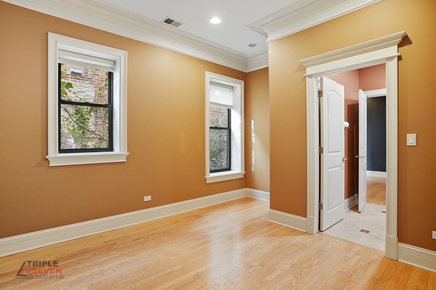 5039 South Michigan Avenue, Unit 1S Chicago, IL 60615 - Photo 9 of 25 a view of an empty room with window and closet area