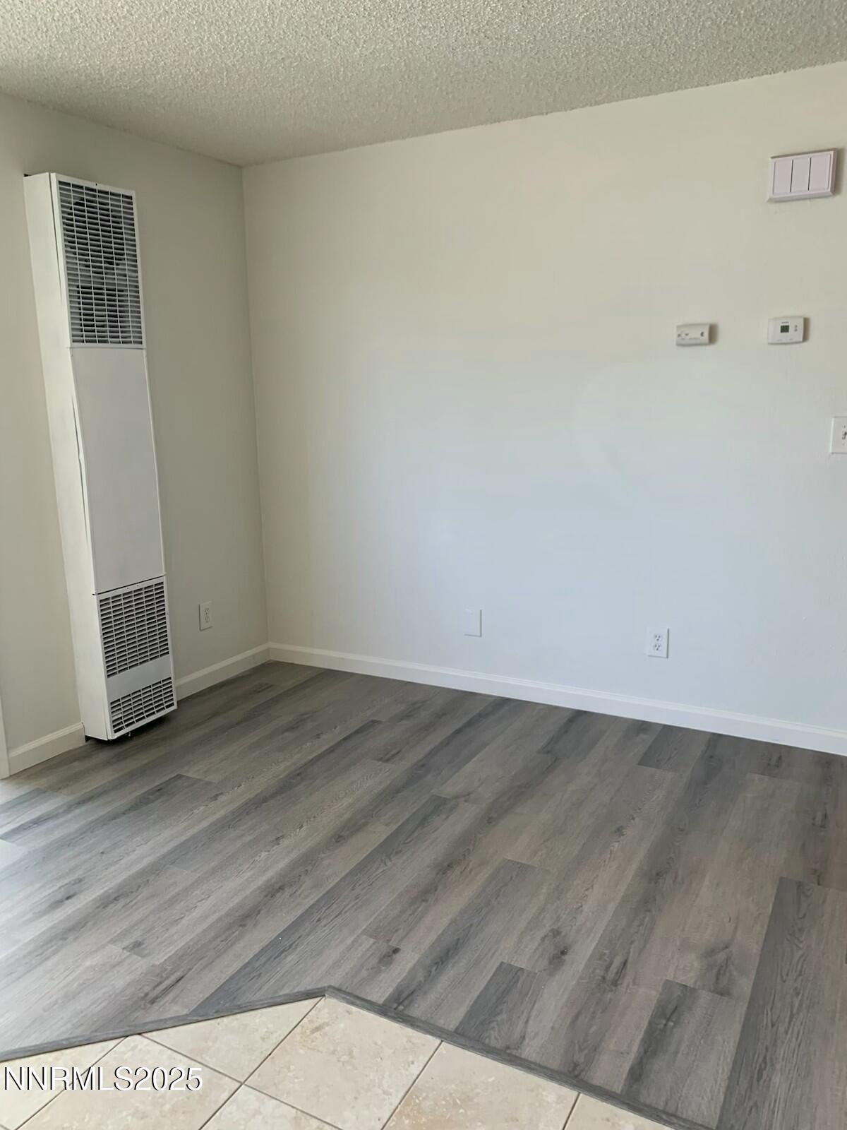 29 Park Street Reno, NV 89502 - Photo 14 of 17 an empty room with wooden floor