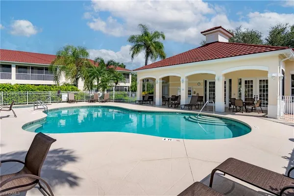 a view of a house with a swimming pool
