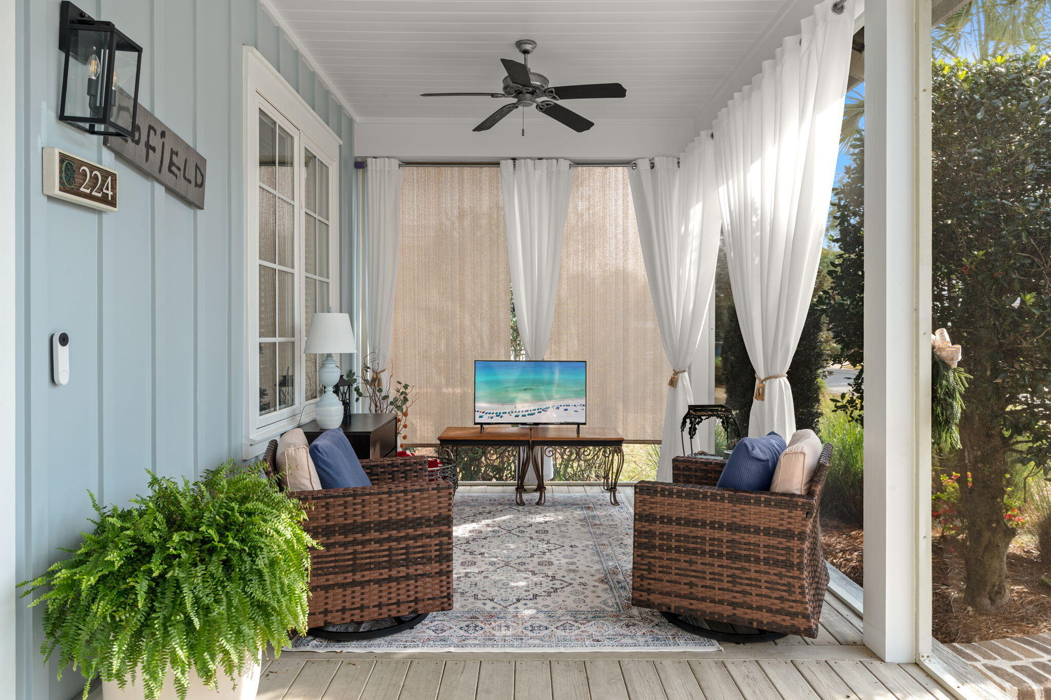 224 Carson Oaks Lane Miramar Beach, FL 32550 - Photo 19 of 27 a living room with furniture and a chandelier