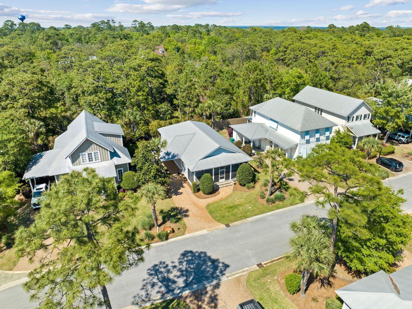 224 Carson Oaks Lane Miramar Beach, FL 32550 - Photo 23 of 27 an aerial view of a house with a garden