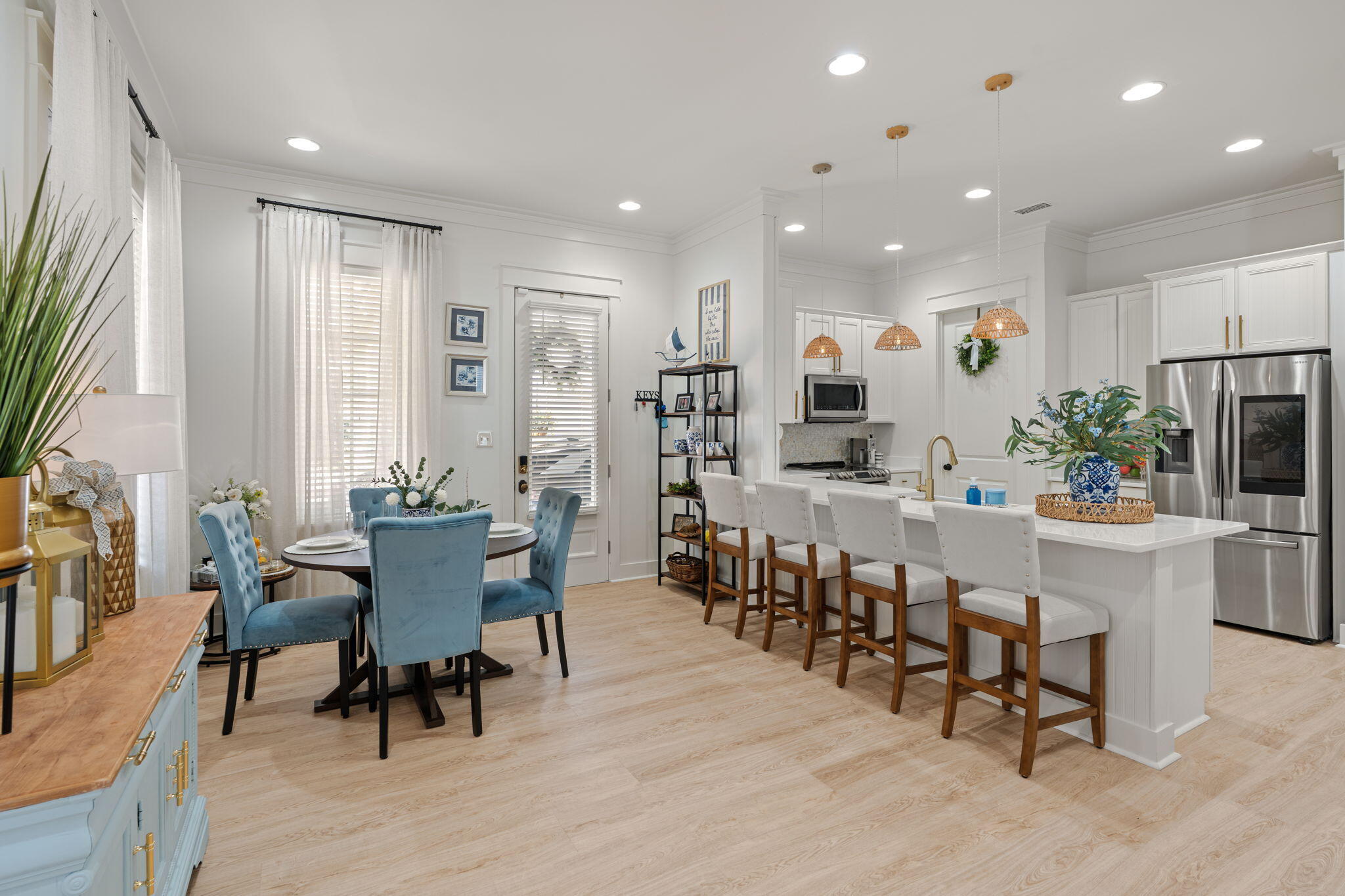 224 Carson Oaks Lane Miramar Beach, FL 32550 - Photo 6 of 27 a view of a dining room with furniture window and wooden floor