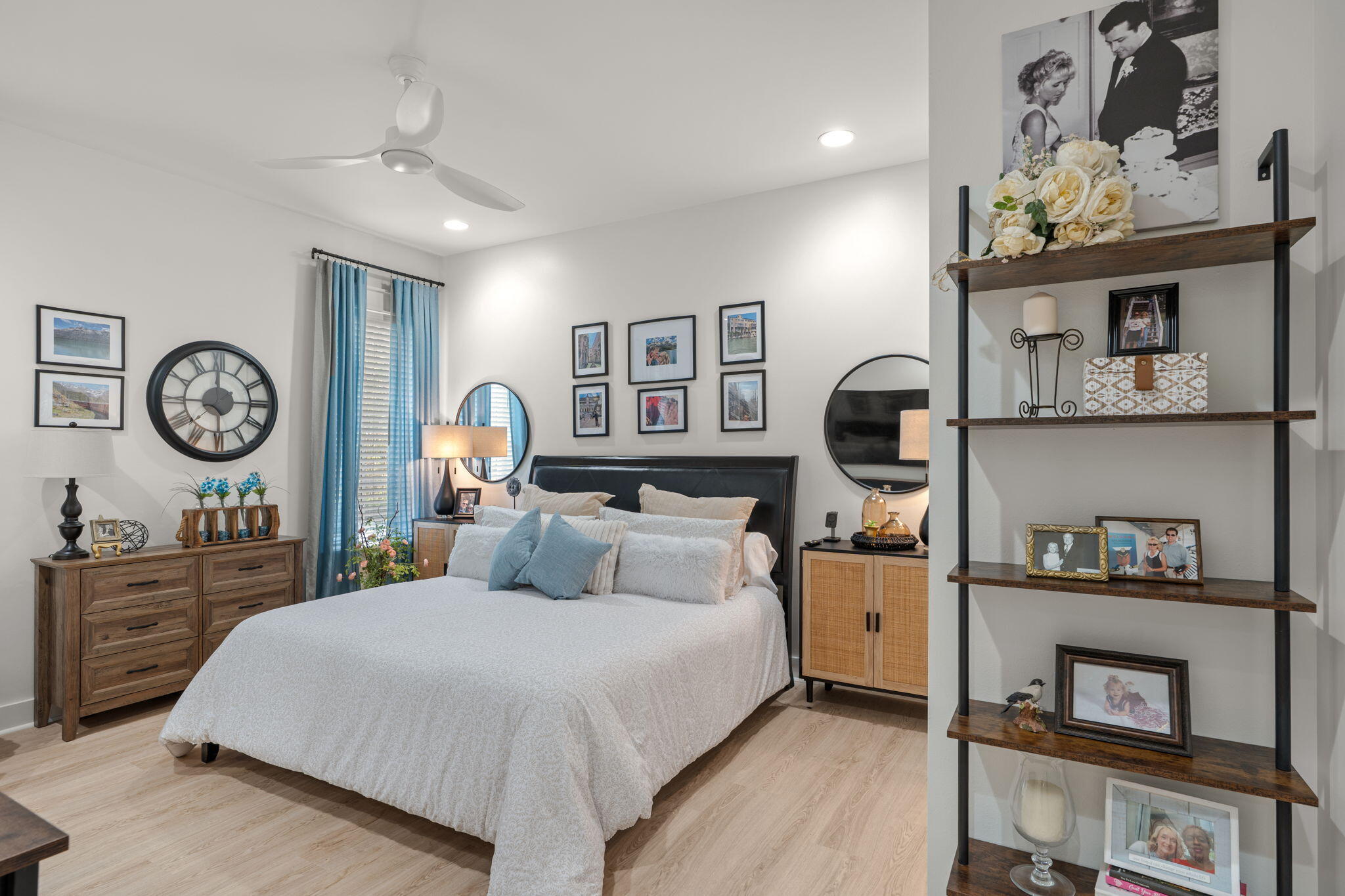 224 Carson Oaks Lane Miramar Beach, FL 32550 - Photo 10 of 27 a bedroom with a bed and a chandelier