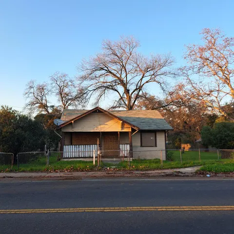 front view of a house with a street