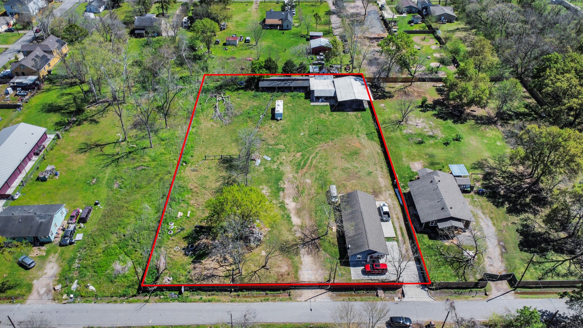 9426 Tower Street Houston, TX 77088 - Photo 1 of 7 an aerial view of a house with a garden and plants