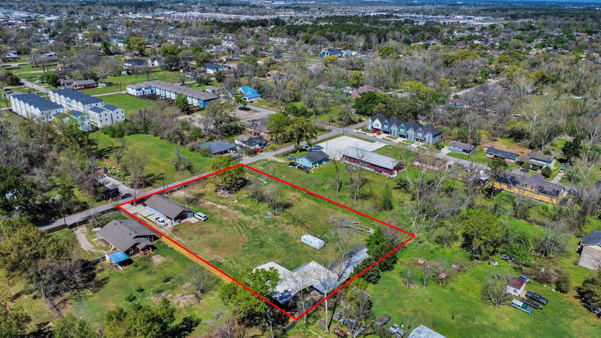 9426 Tower Street Houston, TX 77088 - Photo 2 of 7 an aerial view of a residential houses with outdoor space and trees