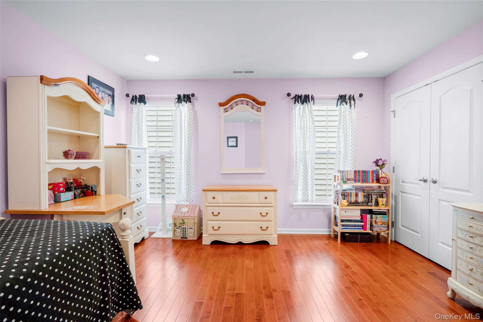 653 Creekside Lane Fishkill, NY 12524 - Photo 26 of 36 a bedroom with furniture and a window