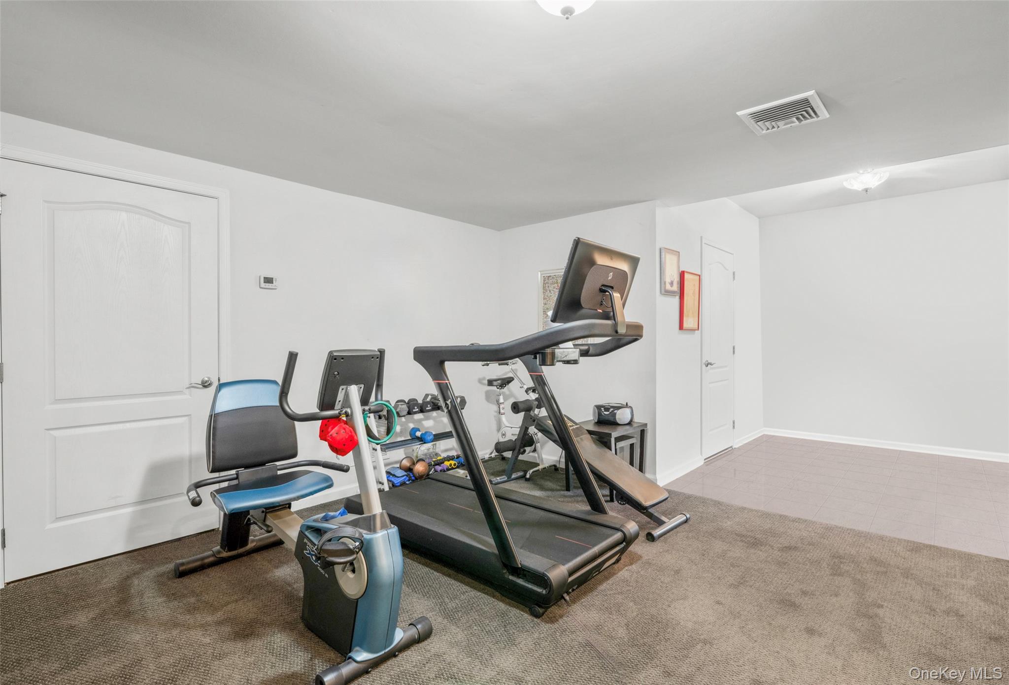 653 Creekside Lane Fishkill, NY 12524 - Photo 31 of 36 a view of a room with gym equipment