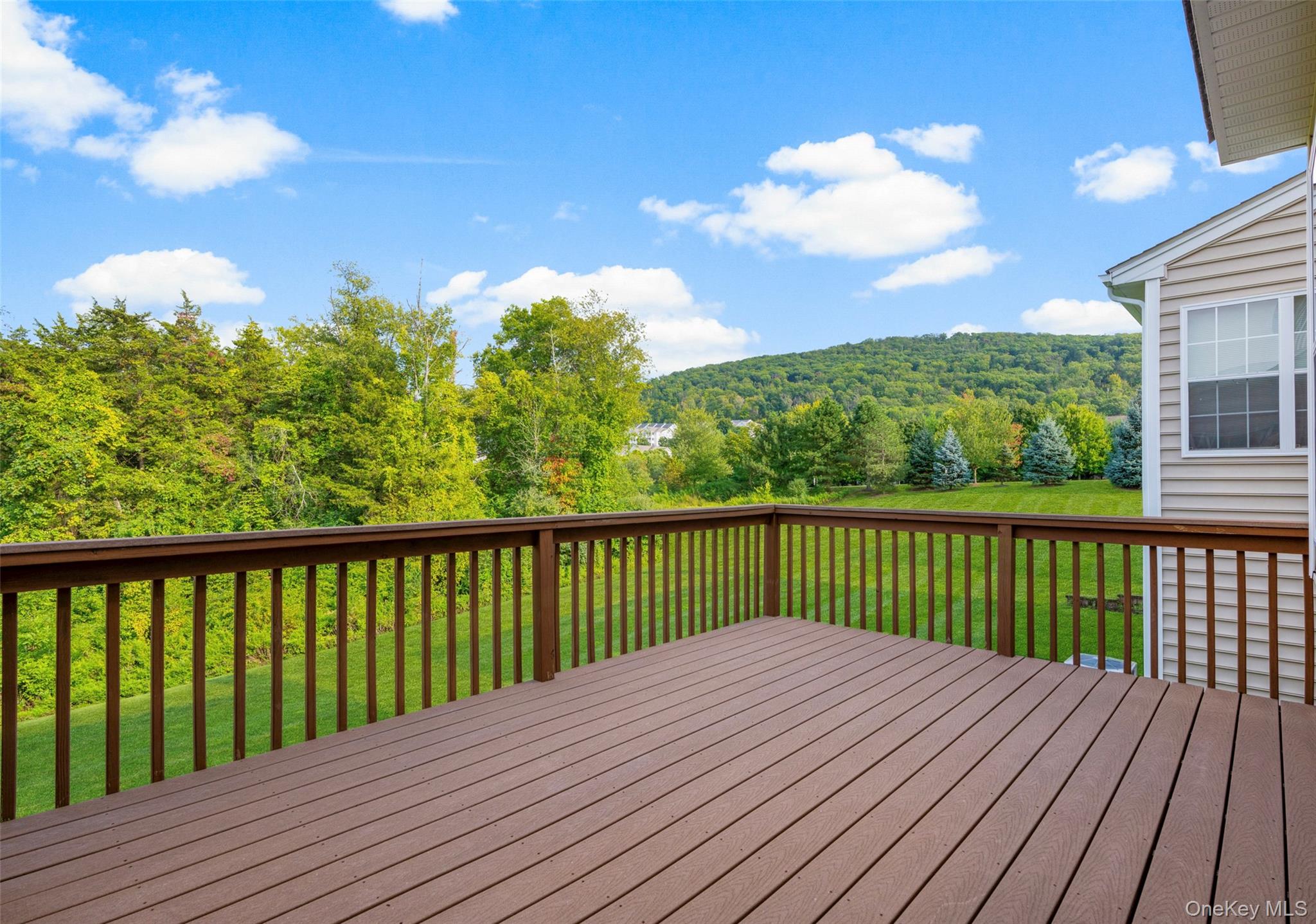 653 Creekside Lane Fishkill, NY 12524 - Photo 33 of 36 a view of balcony with wooden floor