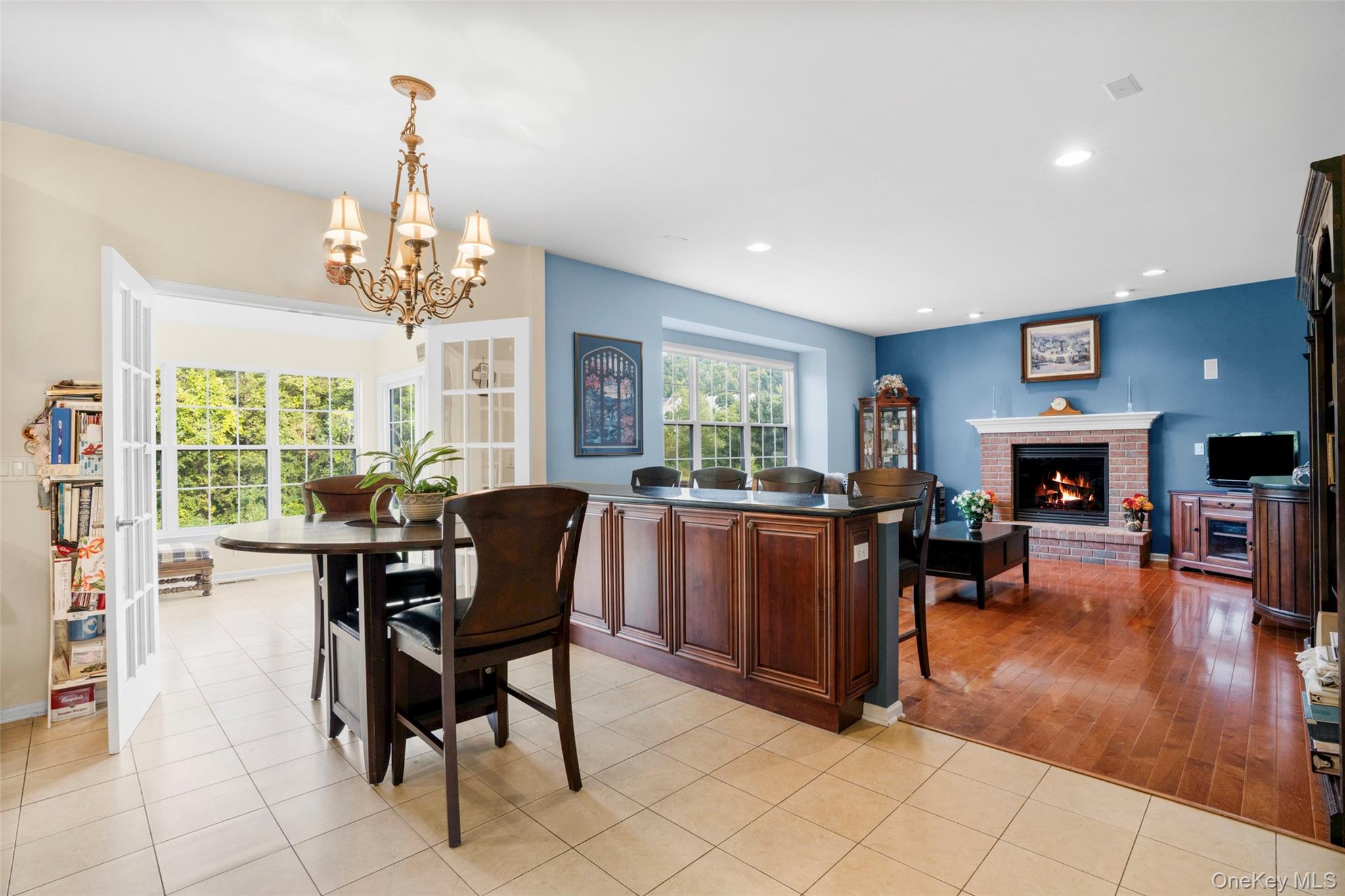 653 Creekside Lane Fishkill, NY 12524 - Photo 10 of 36 a view of a dining room with furniture window and wooden floor