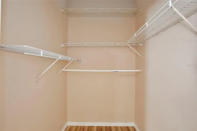 a view of an empty walk in closet