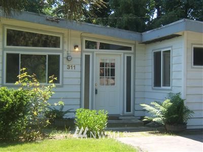 311 Northwest 6th Street Renton, WA 98057 - Photo 1 of 1 a front view of a house
