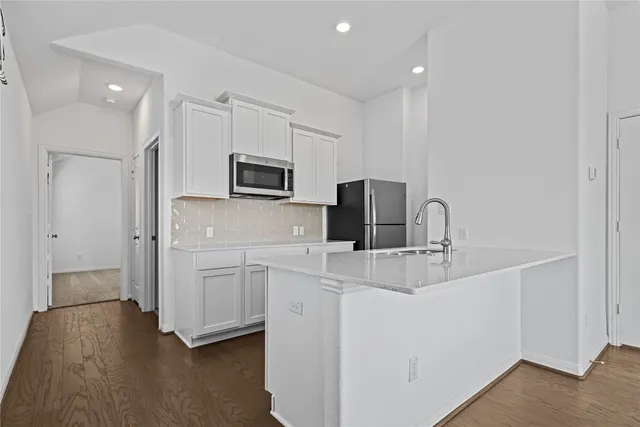 a bathroom with a sink and a window