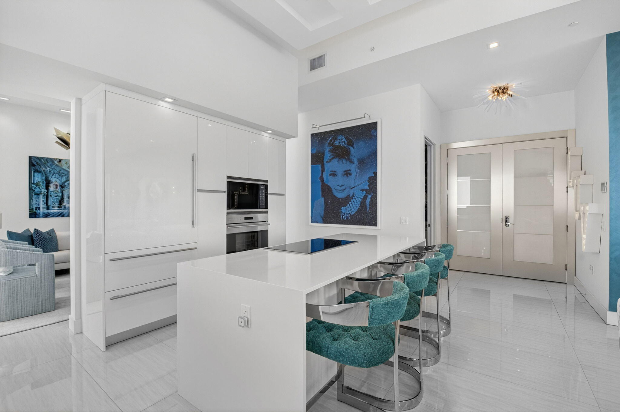 20155 Boca W Drive, Unit PHB904 Boca Raton, FL 33434 - Photo 14 of 50 a living room with furniture and a flat screen tv