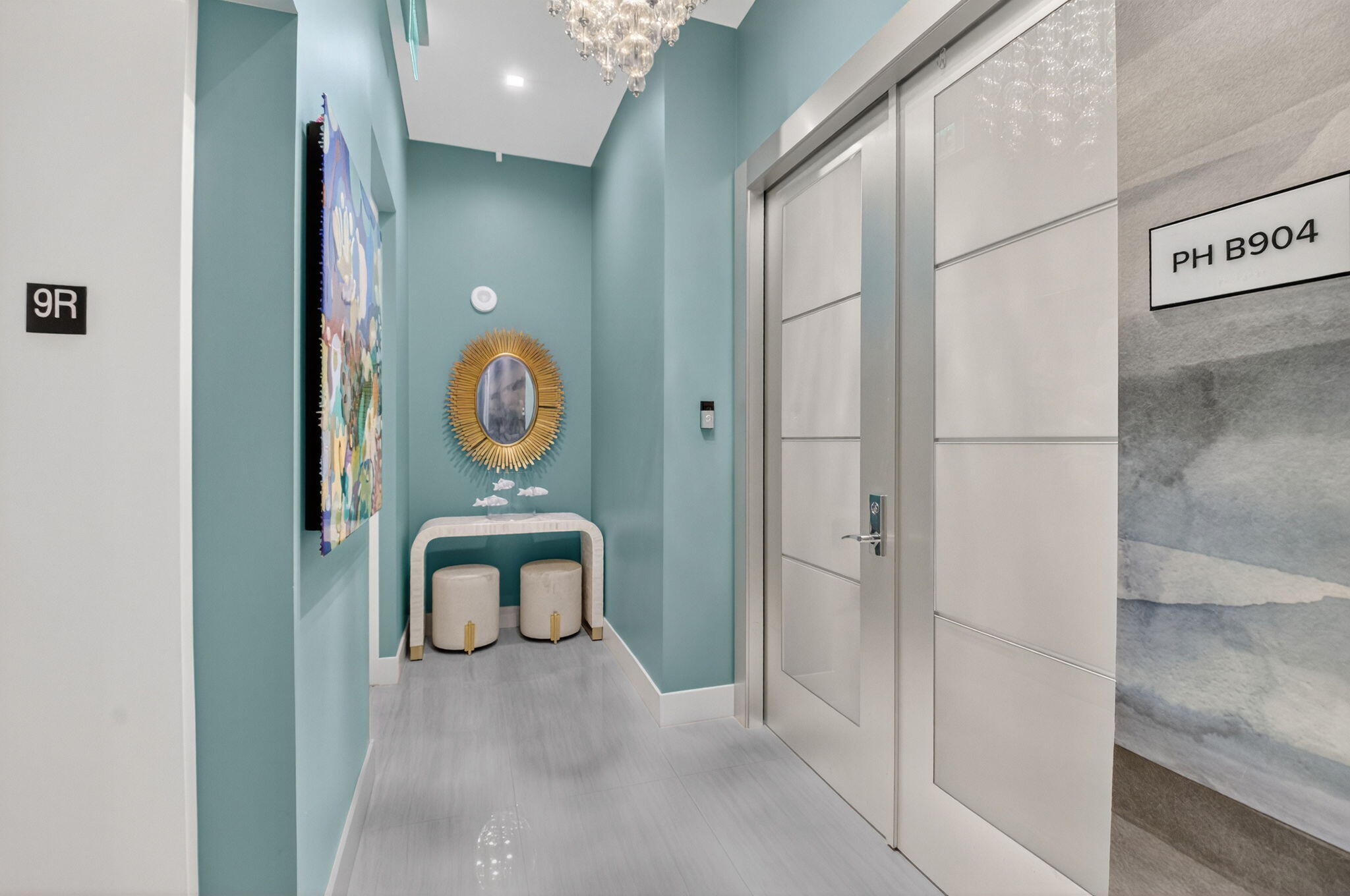 20155 Boca W Drive, Unit PHB904 Boca Raton, FL 33434 - Photo 2 of 50 a room with painting and a door