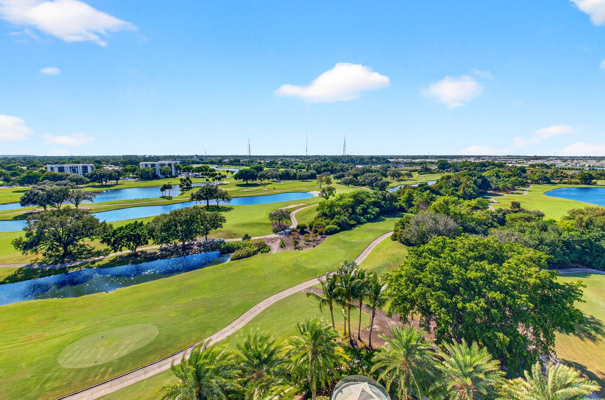 20155 Boca W Drive, Unit PHB904 Boca Raton, FL 33434 - Photo 31 of 50 a view of a lake with a city