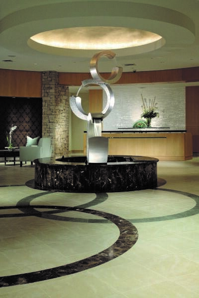 20155 Boca W Drive, Unit PHB904 Boca Raton, FL 33434 - Photo 44 of 50 a living room with granite countertop furniture and a fireplace