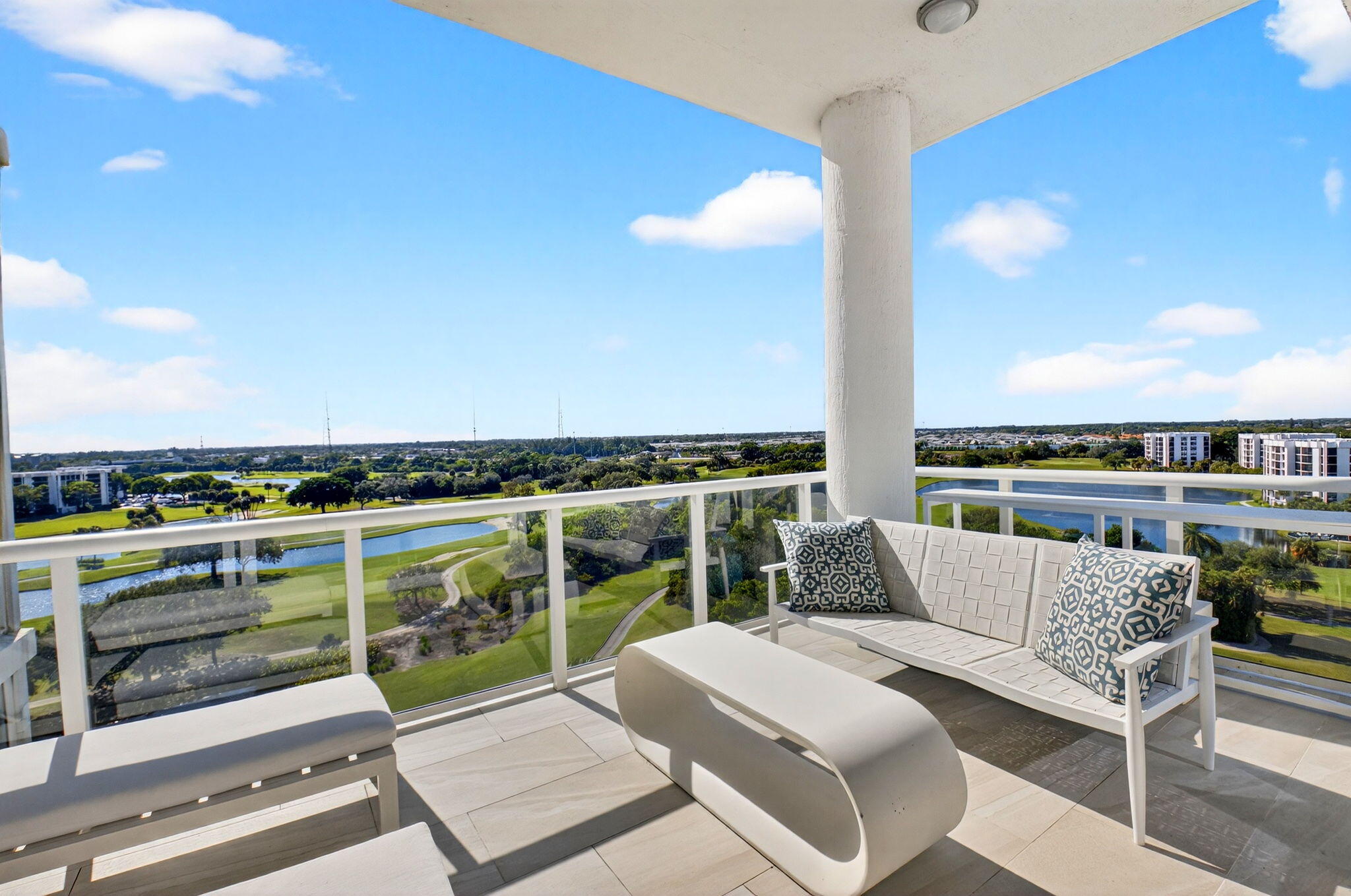 20155 Boca W Drive, Unit PHB904 Boca Raton, FL 33434 - Photo 8 of 50 a view of balcony with seating space