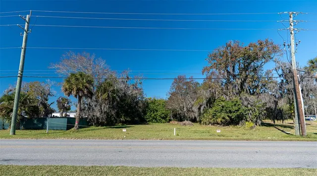a view of a swimming pool with seating area