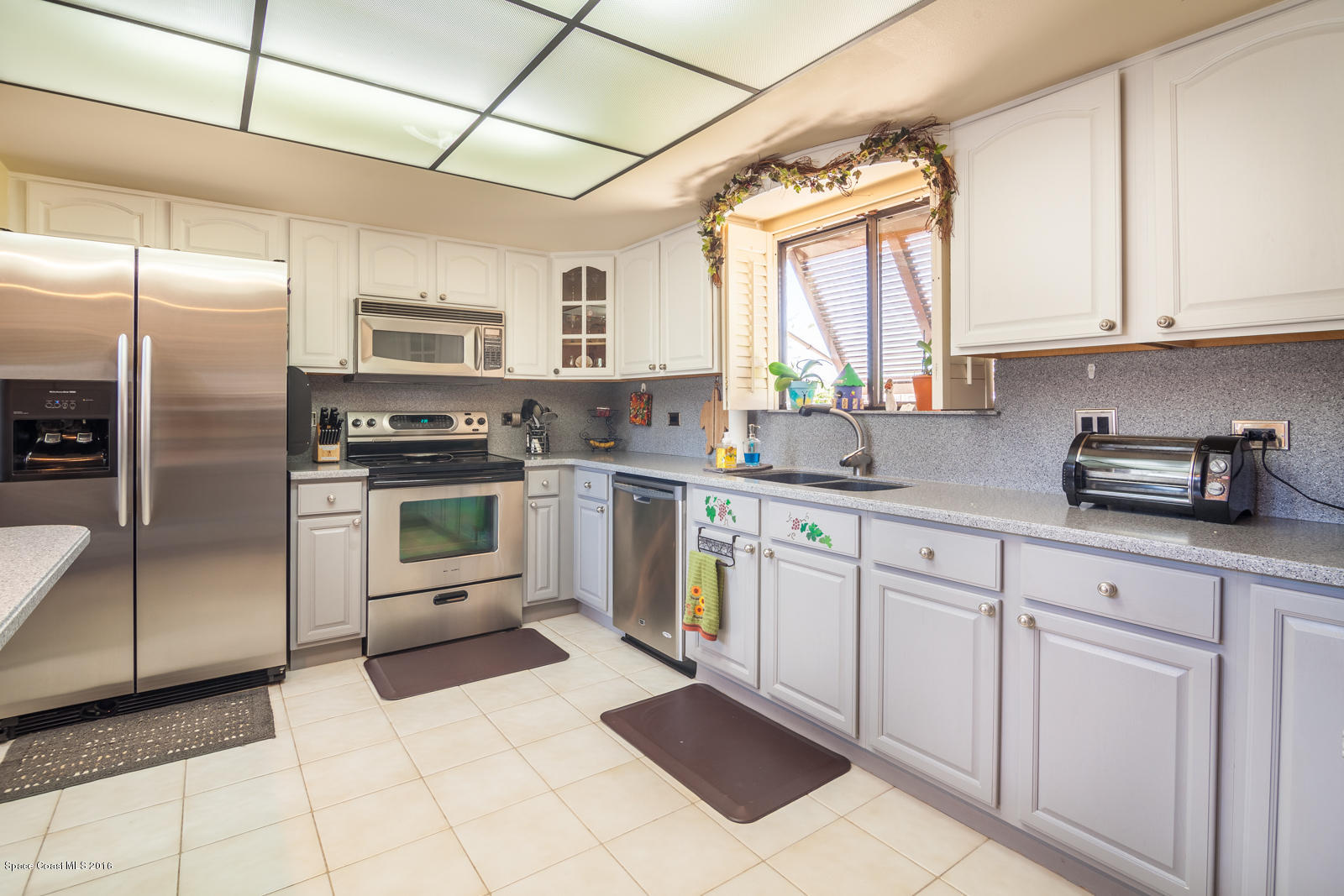 822 Cardinal Road Cocoa, FL 32926 - Photo 22 of 30 Kitchen with stainless appliances
