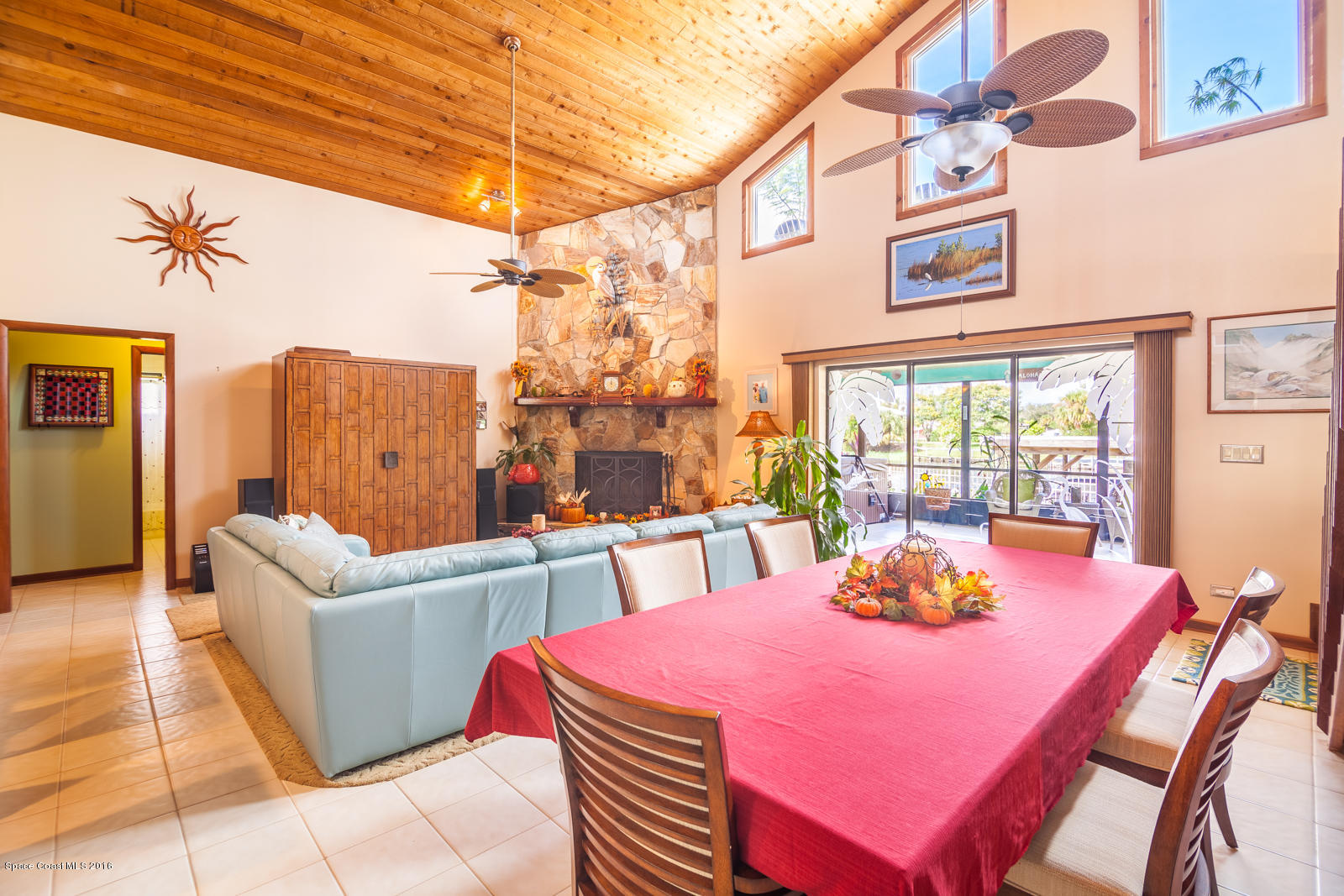 822 Cardinal Road Cocoa, FL 32926 - Photo 23 of 30 DR/LR with pocket sliding doors to porch