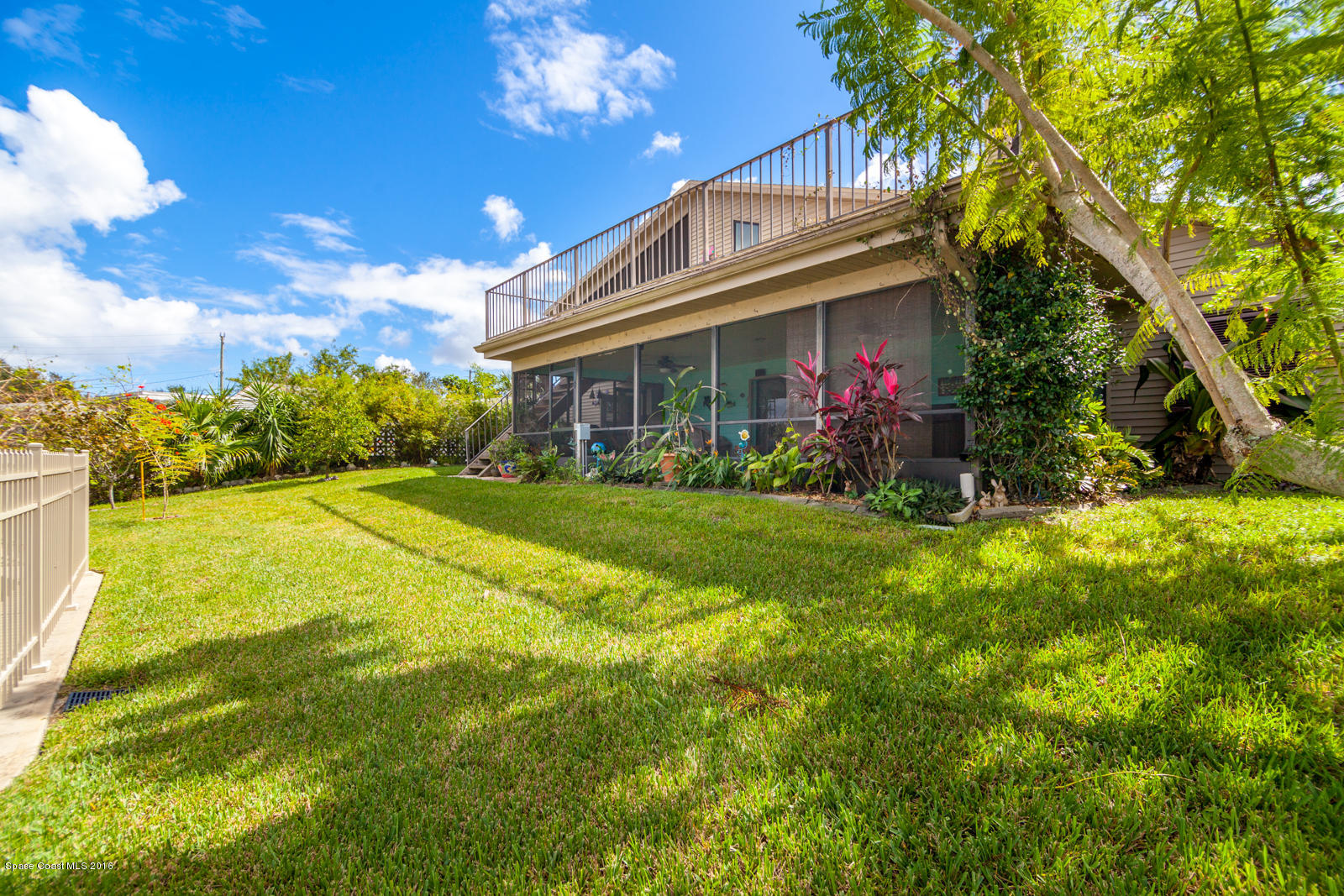 822 Cardinal Road Cocoa, FL 32926 - Photo 30 of 30 Backyard and grass