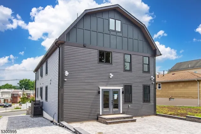 a front view of a house with a garage