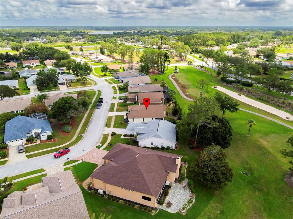 11228 Windrush Circle Hudson, FL 34667 - Photo 46 of 67 an aerial view of residential houses with outdoor space and swimming pool