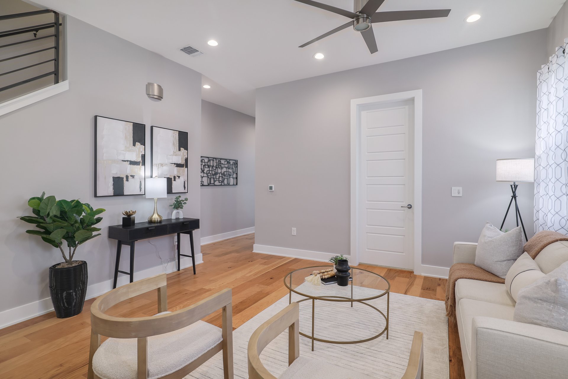 1103 Saucedo Street, Unit B Austin, TX 78721 - Photo 6 of 26 With plenty of wall space for your favorite art and a layout that easily adapts to your own furniture and decor, the living room offers a versatile backdrop for making the home truly yours